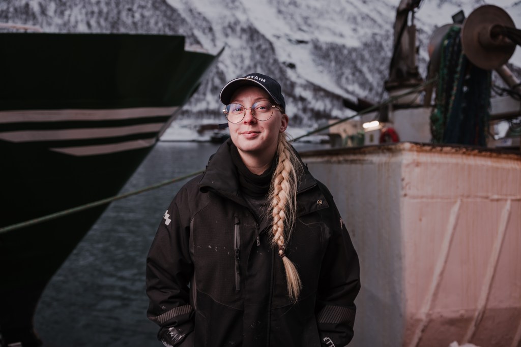 Girl standing on the dock
